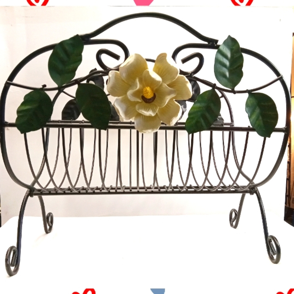 BLACK WROUGHT IRON LOG HOLDER WITH DECORATIVE METAL LEAVES AND FLOWERS